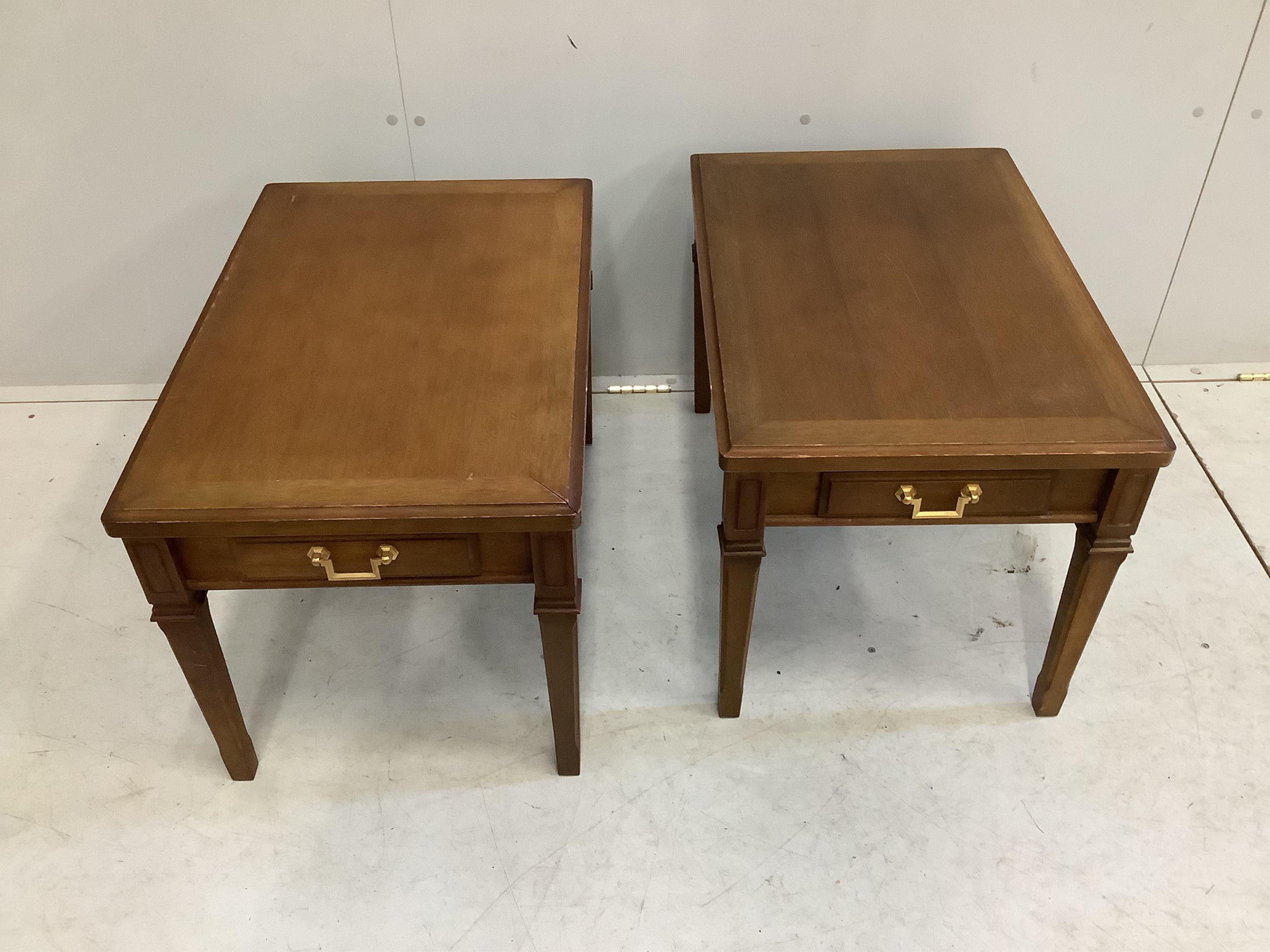 A pair of Maruni Furniture mahogany lamp tables, width 45cm, depth 68cm, height 45cm. Condition - fair